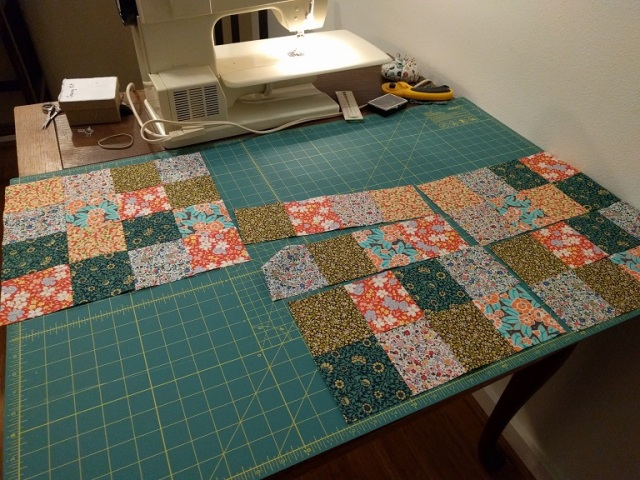 Piecing together quilt blocks